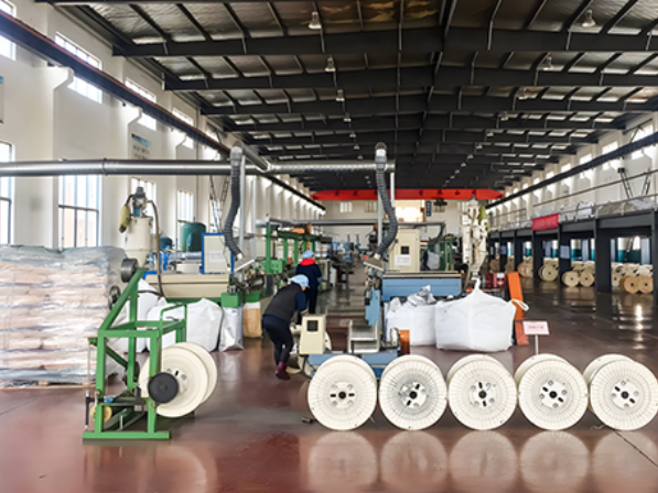 Cable production floor with reels and automated machinery